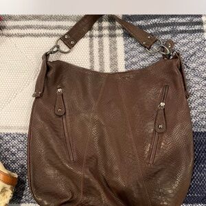Montini: brown leather hobo bag with snakeskin pattern